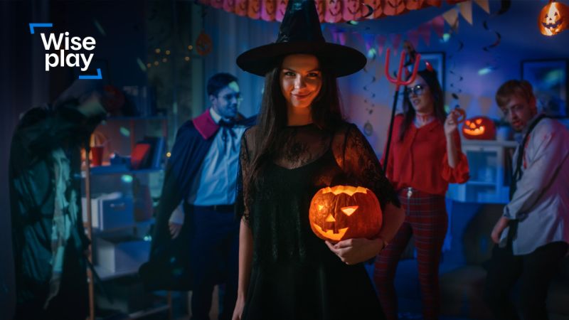 Costumed participants in a festive Halloween atmosphere